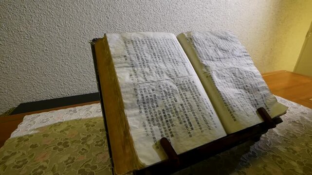 Holy Bible Written in Chinese on Book Stand, Close Up