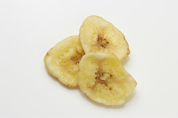 Dried Banana Chips assorted on white background © Thomas Montini