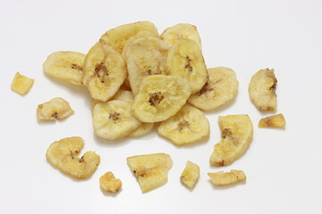 Dried Banana Chips assorted on white background © Thomas Montini