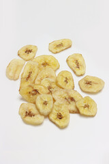 Dried Banana Chips assorted on white background © Thomas Montini