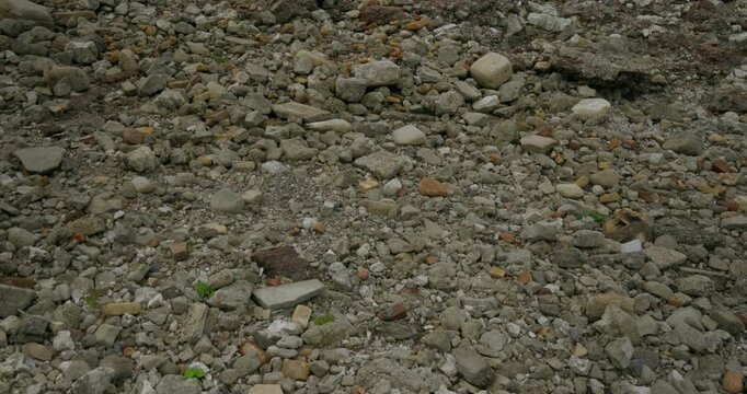 Cinematic tilt up shot of Scottish rocky beach