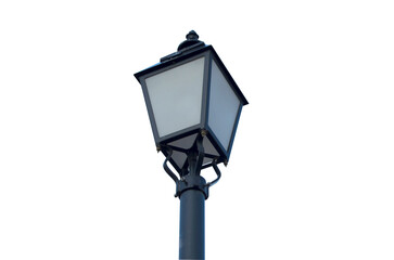 Classic black street lamp with traditional lantern design, isolated on transparent background. © Olena Smerichka