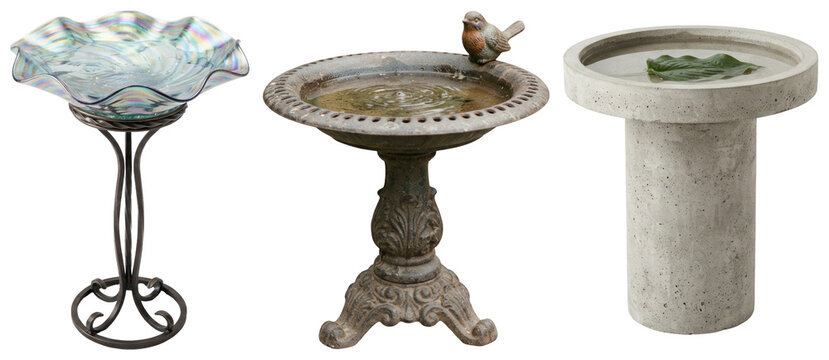 A trio of decorative birdbaths in glass, cast iron, and concrete with varied modern and vintage garden styling.