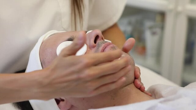 Facial treatment in a salon, relaxing experience in a beauty room