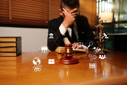Asian Lawyer or Judge Holding Gavel with Digital Legal Technology Network Icons