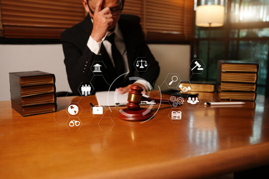 Asian Lawyer or Judge Holding Gavel with Digital Legal Technology Network Icons