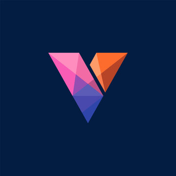 Colorful polygonal letter V logo design element on dark background