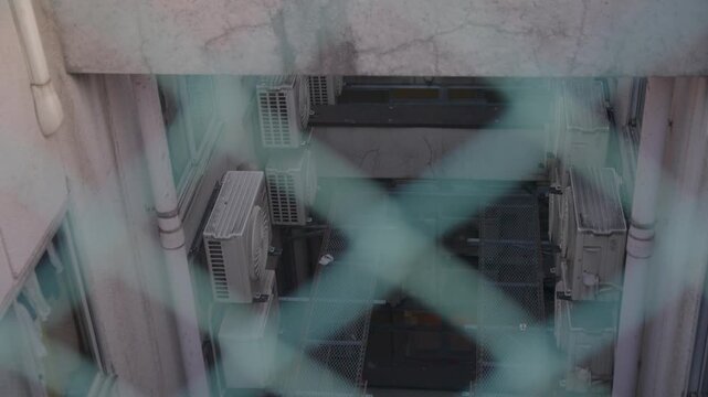 Decaying Urban Building Background Shot, Looking Through Chain Link Fence