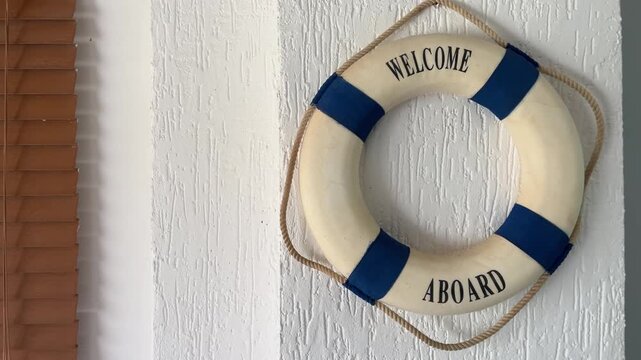 Nautical life buoy decoration hanging on beach house wall