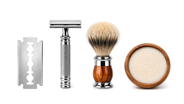 Traditional wet shaving accessories set with safety razor blade brush and wooden soap bowl isolated on white background.