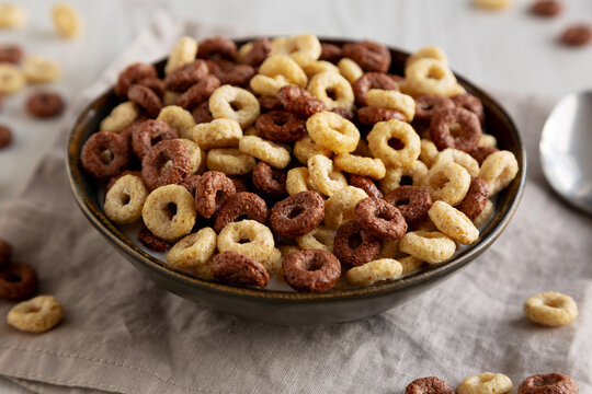 Healthy Breakfast Cereal with Whole Milk in a Bowl, side view. Close-up.