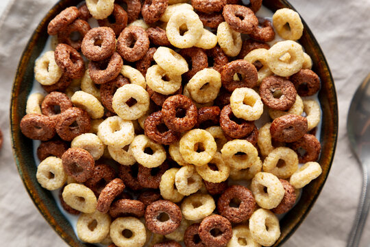 Healthy Breakfast Cereal with Whole Milk in a Bowl, top view.