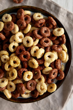 Healthy Breakfast Cereal with Whole Milk in a Bowl, top view.