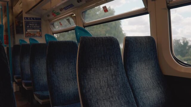 Interior of a British suburban electric train, likely a Class 465 or similar Networker train operated in the London and South East region, United Kingdom - August 22, 2026.