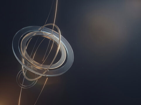 Abstract glass rings suspended on thin wires resembling a planetary system or armillary sphere.
