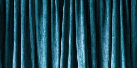 Fototapeta premium Elegant blue velvet curtains with soft shadows and rich texture folds. Luxury textile backdrop for interior design presentation, theater stage background, cinema premier, and premium brand layout.