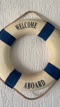 Nautical life buoy decoration hanging on beach house wall
