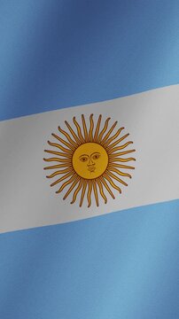 Realistic argentinian flag with its characteristic sun of may emblem waving in the wind. The national banner of argentina in motion