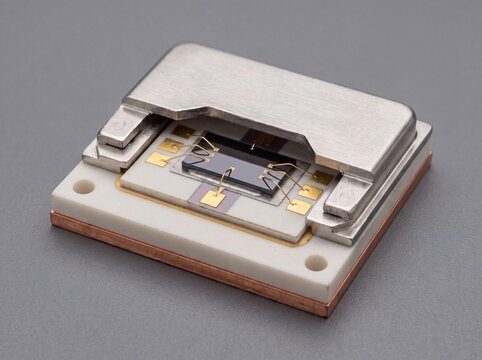 Cutaway Engineering Model of an Internal Semiconductor Chip Package With Gold Wire Bonds