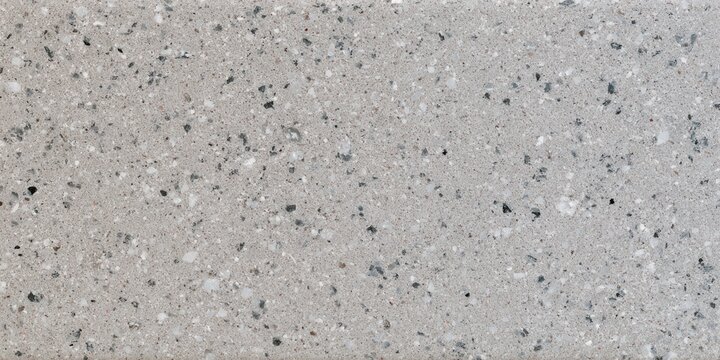 Surface of gray stone with speckles in a uniform pattern for interior design
