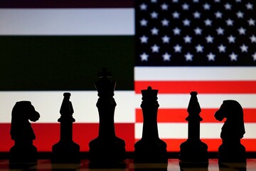 Thailand and United States flags behind chess pieces. Diplomatic strategy and trade negotiations. © Blossom Stock Studio