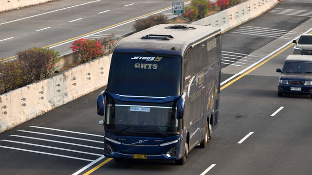 A dark blue GHTS double decker passenger intercity bus using Volvo chassis