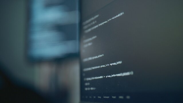 White text fills a darkened panel as software for a developer and engineer links binary ideas to coding, while software for a developer and engineer links binary ideas to coding near a blurred panel.