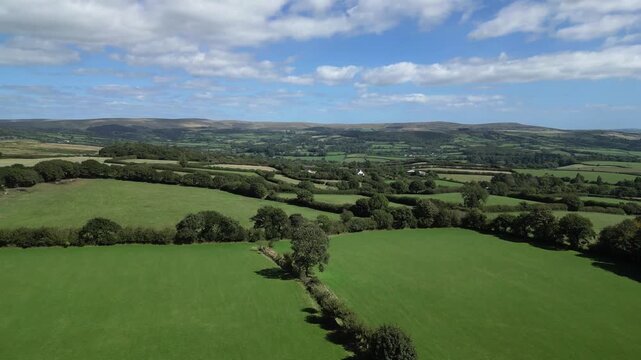 Hemerdon, Devon, England: DRONE VIEWS: Countryside looking towards the south-west hill ranges of Dartmoor National Park. The Park covers 368 sq. miles and achieved national park status in 1951.