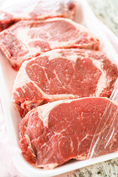 Unpacking Rib Eye Steak in Modern Kitchen