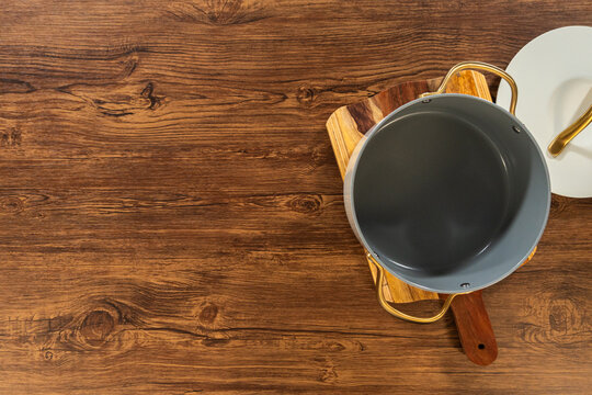 Gray Pot on Wooden Cutting Boards Overhead