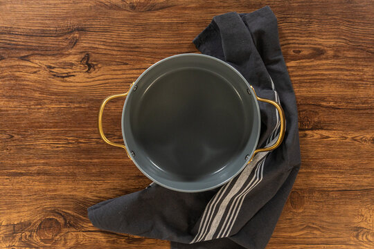 Cooking Pot on Rustic Table with Cloth