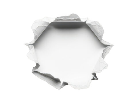 Circular hole torn in white paper with curled edges