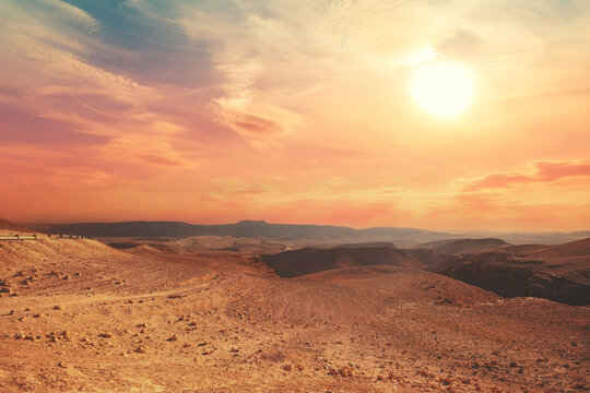Mountain nature landscape. Desert in early morning. Beautiful sunrise in mountains. Judaean Desert. View of valley with mountains on backdrop. Nature Israel.