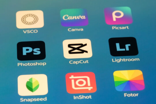 Shanghai,China-Sep.6th 2026: editing app icons including VSCO, Canva, Picsart, Photoshop, CapCut, Lightroom, Snapseed, InShot, and Fotor displayed on a smartphone screen.