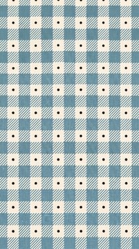 Light blue gingham fabric pattern background with small dots
