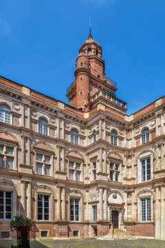 View of the inner courtyard at Hotel d'Assezat in Toulouse, France. Renaissance architecture under sunny sky
