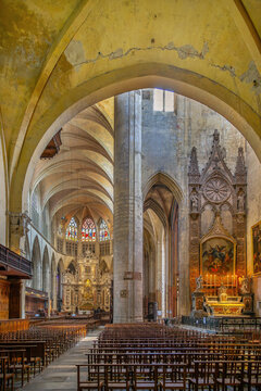 Interior view of Toulouse Cathedral, France. Perspective from crossing vault towards the main altar and a side chapel
