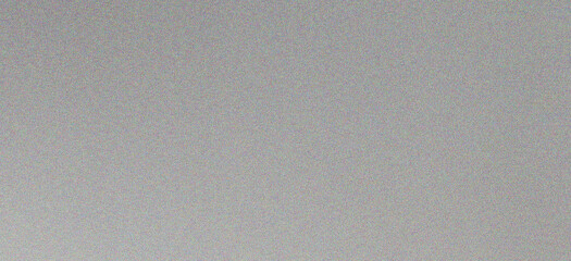 Light grey and silver gradient background, with a subtle, grainy texture and, a soft light, transition across the, horizontal surface area © cicilia
