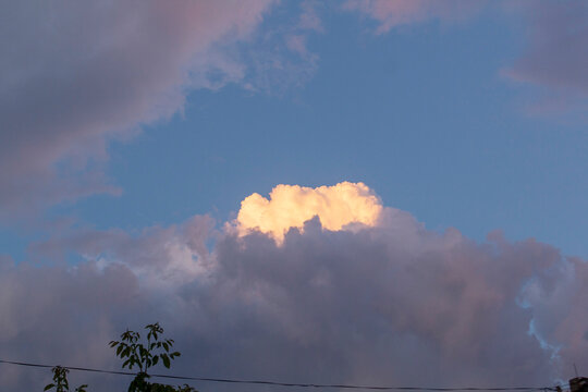 Sunset Sky Over Rural Moldova with Utility Wires and Silhouetted Trees