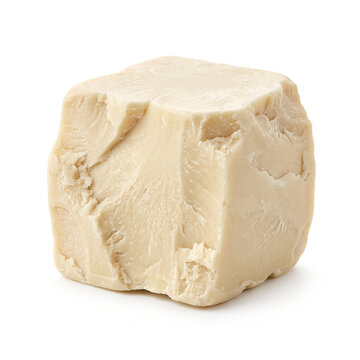 Fresh yeast cube isolated on white, showing natural crumbly texture and organic beige color, ideal for baking bread, pastry dough, brewing, fermentation, and culinary recipe concepts