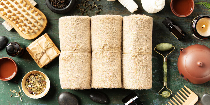Luxury Spa Flatlay with Towels, Tea, and Natural Wellness Tools
