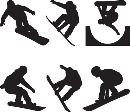 Silhouetted snowboarders in winter snow landscape at sunset