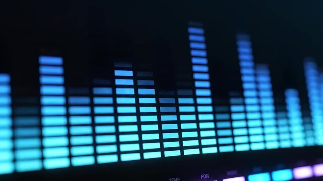 Blue equalizer bars pulsing with light during an abstract digital audio visualization with dark background