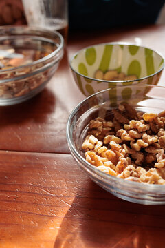 Walnuts and other healthy nuts serving in bowls