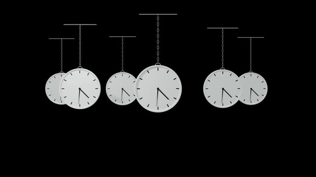 Static swinging analog wall clocks on chains isolated on black background