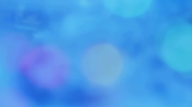 Soft blue abstract light forms drift through a defocused digital space. Presentation design, title sequences, and social media graphics.
