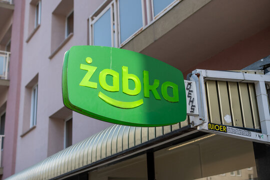 Warsaw, Poland-August 12, 2026. Sign of  a Zabka local mini supermarket store at a street of the city.