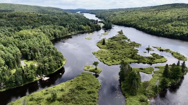 Drone flight above cascades and waterfalls park on the Ouareau River, in Rawdon, Quebec, Canada.