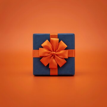 A single gift box with a bright orange ribbon on an orange background