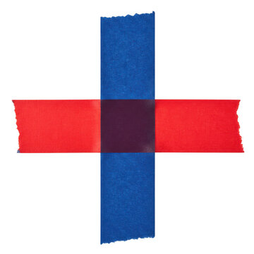 Red and blue adhesive tape strips crossed to form a plus sign shape on a flat surface for office design